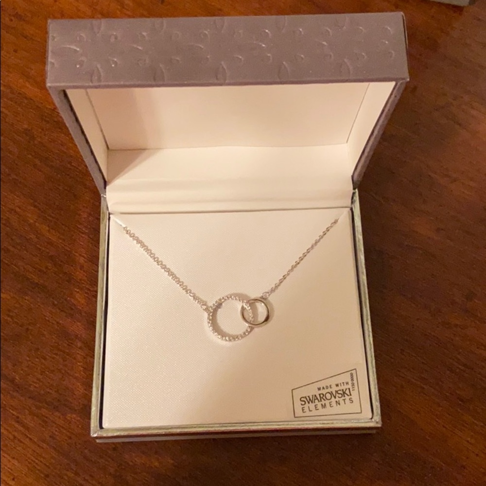 Brand new swarovski necklace and earrings!